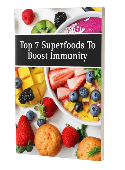 Cover image of a book titled "Top 7 Superfoods To Boost Immunity" featuring a colorful assortment of fruits such as strawberries, blueberries, kiwi, and mango, along with small round muffins against a white background.