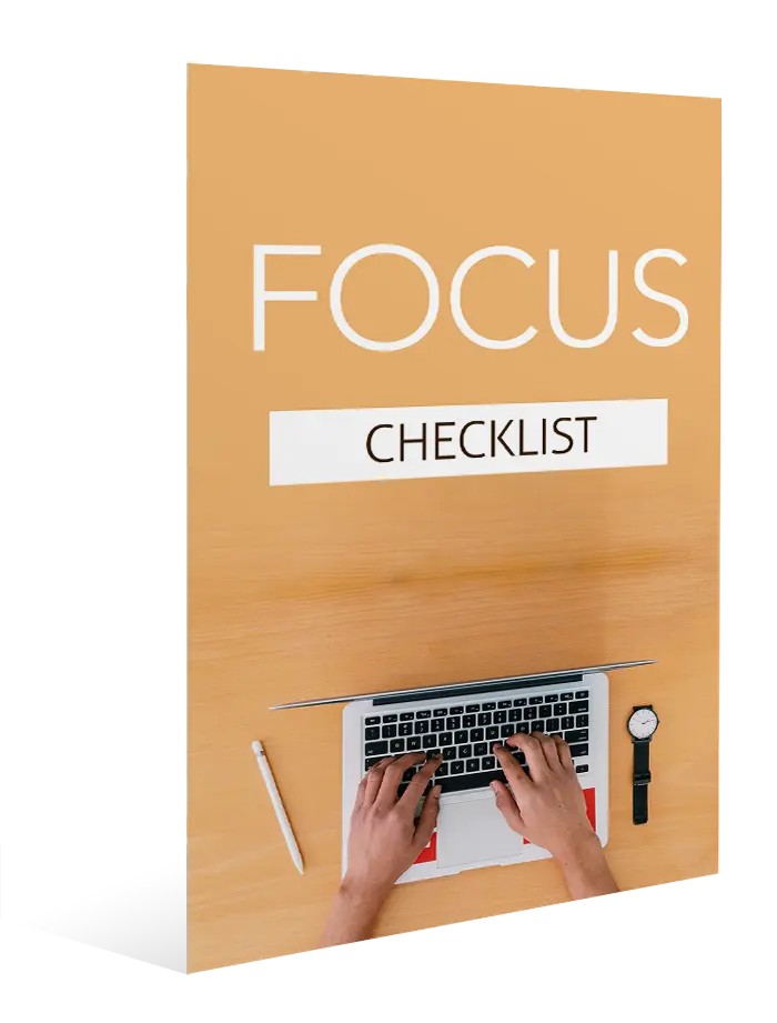 A person typing on a laptop with a wooden desk. Nearby are a pencil and a wristwatch. The image features the text "FOCUS CHECKLIST" above the desk setup.